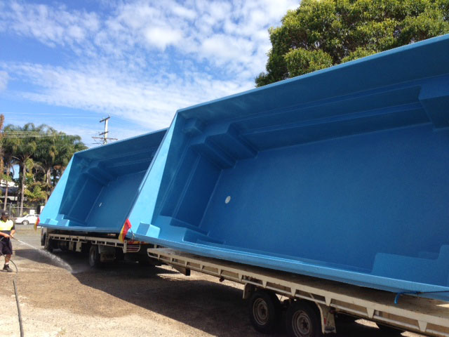 Fiberglass pools being transported